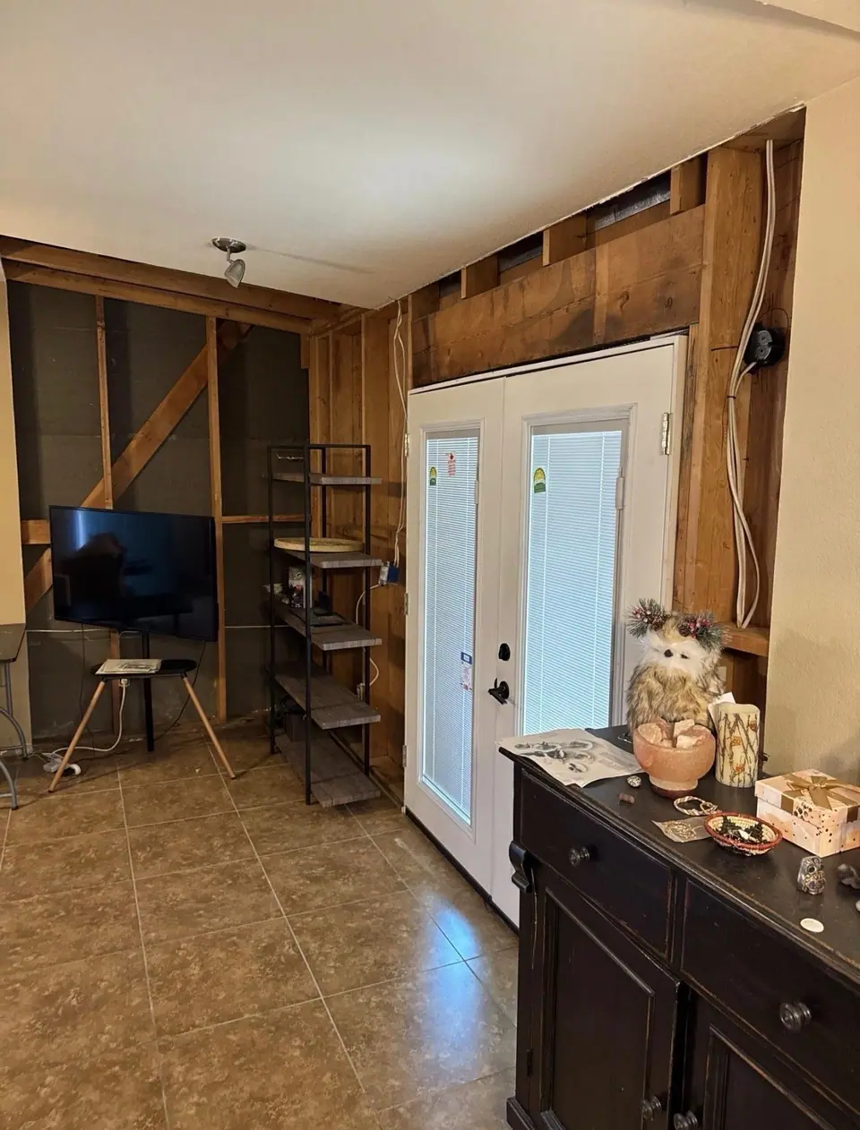 Drywall removed after a leak, ready for drying
